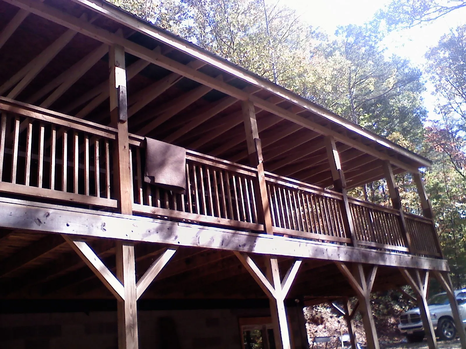 Timber framing under a new elevated porch and deck — Roof Leak Repair in Osakis by Roofing Brothers